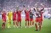 Bayern players thank the fans at the end of the German Bundesliga soccer match between RB Leipzig and FC Bayern Munich at the Red Bull Arena in Leipzig, Germany, Saturday, May 3, 2025. (AP Photo/Ebrahim Noroozi)