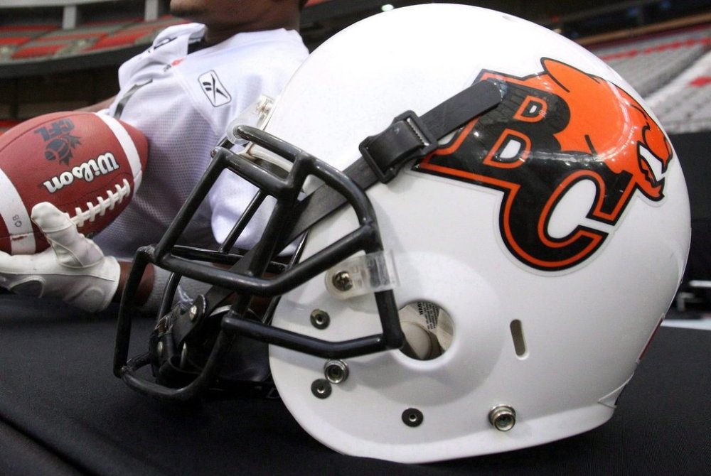 A B.C. Lions helmet is seen on a table during a practice in Vancouver, B.C., Friday, Nov. 25, 2011. Larry Donovan, a former head coach of the B.C. Lions, has died. He was 84. THE CANADIAN PRESS/Ryan Remiorz