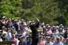 Rory McIlroy, of Northern Ireland, hits from the 12th tee during a practice round at the Masters golf tournament, Tuesday, April 8, 2025, in Augusta, Ga. (AP Photo/Matt Slocum)
