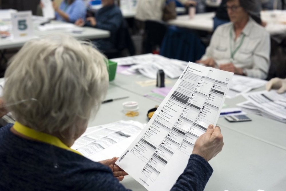 FILE - Election workers sort ballots from the 2024 election at the Clackamas County Elections office on Thursday, Nov. 7, 2024, in Oregon City, Ore. (AP Photo/Jenny Kane, File)