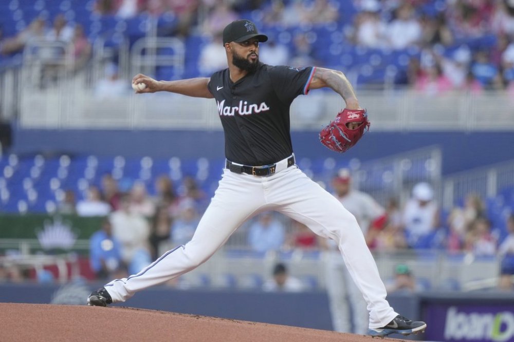 Miami Marlins pitcher Sandy Alcantara aims a pitch during the first inning of a baseball game against the Washington Nationals, Saturday, April 12, 2025, in Miami. (AP Photo/Marta Lavandier)