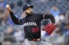 Minnesota Twins starting pitcher Pablo Lopez throws during the first inning of a baseball game against the Kansas City Royals, Tuesday, April 8, 2025, in Kansas City, Mo. (AP Photo/Charlie Riedel)
