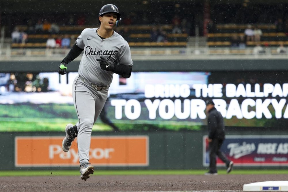 Chicago White Sox's Miguel Vargas (20) rounds the bases after hitting a home run during the sixth inning of a baseball game against the Minnesota Twins, Thursday, April 24, 2025, in Minneapolis, Minn. (AP Photo/Ellen Schmidt)