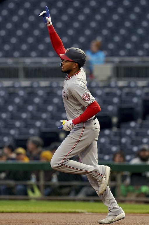 Washington Nationals outfielder James Wood rounds the bases after hitting a home run during the first inning of a baseball game against the Pittsburgh Pirates Tuesday, April 15, 2025, in Pittsburgh. (AP Photo/Matt Freed)