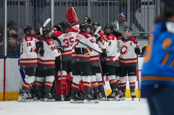 Members of the Ottawa Charge celebrate a win last season. (Arlyn McAdorey / The Canadian Press files)