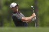 Rory McIlroy, of Northern Ireland, watches his tee shot on the 12th hole during the second round at the Masters golf tournament, Friday, April 11, 2025, in Augusta, Ga. (AP Photo/Matt Slocum)