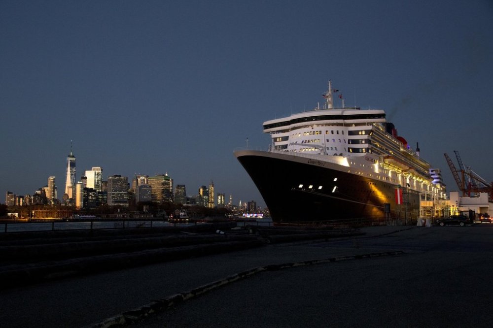FILE - The Queen Mary 2 prepares to depart the Red Hook Terminal, bound for Southampton, England, in the Brooklyn borough of New York, Nov. 11, 2018. (AP Photo/Mark Lennihan, File)