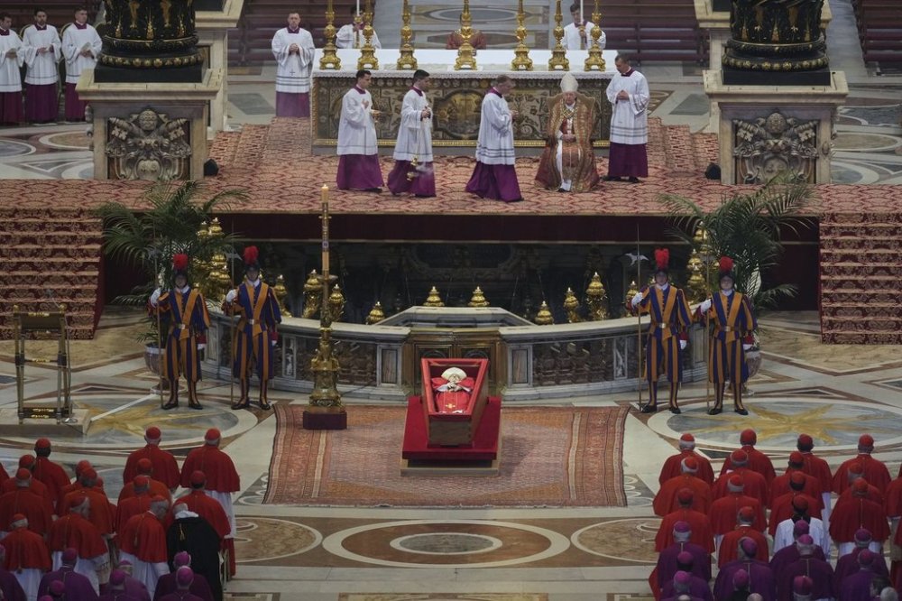 The body of Pope Francis lies inside St. Peter's Basilica at the Vatican, Wednesday, April 23, 2025, where he will lie in state for three days. (AP Photo/Andrew Medichini, Pool)