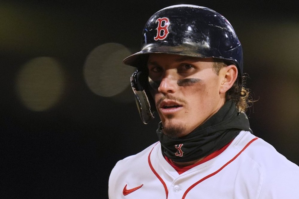 Boston Red Sox outfielder Jarren Duran heads back to the dugout during fourth inning of a baseball game against the Toronto Blue Jays, Tuesday, April 8, 2025, in Boston. (AP Photo/Charles Krupa)