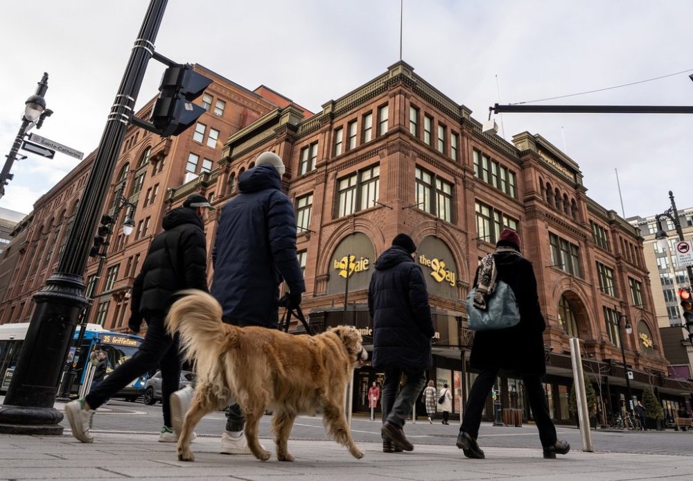 People walk past the Hudson's Bay department store in downtown Montreal on Monday, March 17, 2025. THE CANADIAN PRESS/Christinne Muschi