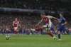 Arsenal's Leandro Trossard attempts a shot at goal and saved by PSG's goalkeeper Gianluigi Donnarumma during the Champions League semifinal first leg soccer match between Arsenal and Paris Saint-Germain at Emirates Stadium in London, England, Tuesday, April 29, 2025. (AP Photo/Kirsty Wigglesworth)