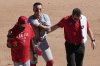 FILE - Los Angeles Angels' Zach Neto holds his shoulder as he heads to the dugout after being caught trying to steal second during the fourth inning of a baseball game against the Chicago White Sox, Sept. 26, 2024, in Chicago. (AP Photo/Charles Rex Arbogast, File)