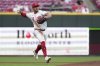 Cincinnati Reds' Noelvi Marte throws to first base for an out in the sixth inning of a baseball game against the St. Louis Cardinals. Monday, April 28, 2025, in Cincinnati. (AP Photo/Kareem Elgazzar)