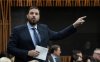 Conservative MP for Battle River-Crowfoot Damien Kurek rises during question period in Ottawa on Thursday, Dec. 14, 2023. THE CANADIAN PRESS/Adrian Wyld