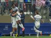 Vancouver Whitecaps' Brian White (left) celebrates his goal against Inter Miami with Ali Ahmed and Tate Johnson during the first half of a CONCACAF Champions Cup semifinal soccer match, in Vancouver, on Thursday, April 24, 2025. THE CANADIAN PRESS/Christopher Morris