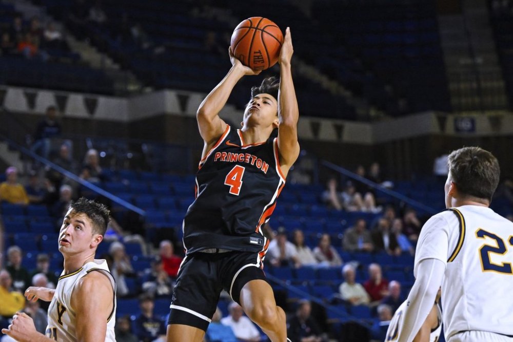 FILE - Princeton guard Xaivian Lee (4) shoots against Navy during the second half of an NCAA college basketball game at the Veterans Classic, Nov. 11, 2022, in Annapolis, Md. (AP Photo/Terrance Williams, File)