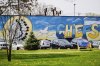 A mural adorns a wall next to the Massapequa High School, in Massapequa, N.Y., Friday, April 25, 2025. (AP Photo/Julia Demaree Nikhinson)