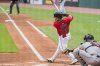 Cleveland Guardians' Steven Kwan (38) hits a double off Boston Red Sox starting pitcher Tanner Houck as catcher Blake Sabol looks on during first inning in the first baseball game of a doubleheader Saturday, April 26, 2025. in Cleveland, (AP Photo/Phil Long)