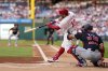 Philadelphia Phillies' Kyle Schwarber hits a two-run home run against Washington Nationals pitcher MacKenzie Gore during the first inning of a baseball game, Tuesday, April 29, 2025, in Philadelphia. (AP Photo/Matt Slocum)