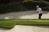 Zach Johnson hits from the bunker on the 12th hole during the second round at the Masters golf tournament, Friday, April 11, 2025, in Augusta, Ga. (AP Photo/Ashley Landis)