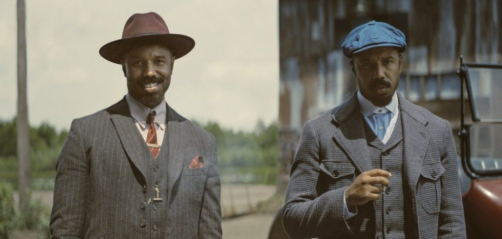 This image released by Warner Bros Pictures shows Michael B. Jordan portraying two characters in a scene from