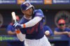 FILE - New York Mets' Francisco Alvarez takes a ball during the fourth inning of a spring training baseball game against the Houston Astros Thursday, Feb. 27, 2025, in Port St. Lucie, Fla. (AP Photo/Jeff Roberson,File)