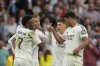 Real Madrid's Kylian Mbappe, second left, celebrates with teammates after scoring his side's second goal during the Spanish La Liga soccer match between Real Madrid and Celta Vigo at the Santiago Bernabeu stadium in Madrid, Spain, Sunday, May 4, 2025. (AP Photo/Jose Breton)