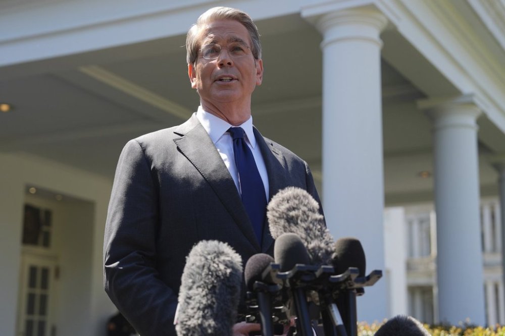 Treasury Secretary Scott Bessent speaks to reporters outside the West Wing of the White House, Wednesday, April 9, 2025, in Washington. (AP Photo/Evan Vucci)