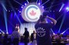 A supporter watches election results come in at Conservative Leader Pierre Poilievre's election night event in Ottawa on Monday, April 28, 2025. THE CANADIAN PRESS/Chris Young