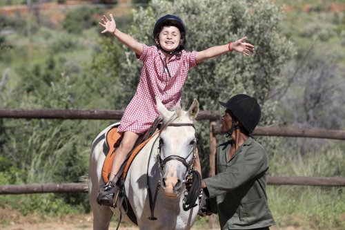 Immanuel Hoxobeb assists Alicia who participates in the 