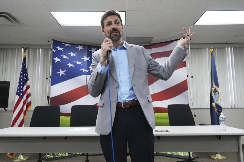 Ryan Kelley speaks at the Jackson County Republican headquarters, Thursday, April 10, 2025, in Jackson, Mich. (AP Photo/Paul Sancya)