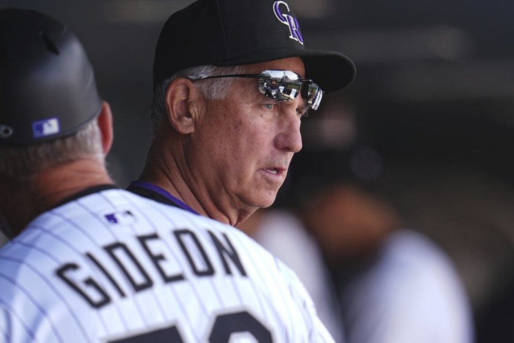 Colorado Rockies manager Bud Black looks on in the first inning of a baseball game against the Athletics Sunday, April 6, 2025, in Denver. (AP Photo/David Zalubowski)