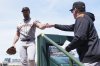 San Francisco Giants starting pitcher Robbie Ray, left, gets a fist pump from manager Bob Melvin after the first inning of a baseball game in Chicago, Wednesday, May 7, 2025. (AP Photo/Nam Y. Huh)
