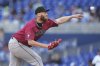 Arizona Diamondbacks relief pitcher A.J. Puk throws during the ninth inning of a baseball game against the Miami Marlins, Thursday, April 17, 2025, in Miami. (AP Photo/Lynne Sladky)