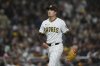 San Diego Padres relief pitcher Ryan Bergert walks towards the dugout after pitching during the eighth inning of a baseball game against the Tampa Bay Rays Saturday, April 26, 2025, in San Diego. (AP Photo/Gregory Bull)