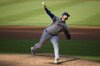 New York Mets starting pitcher Clay Holmes throws during the second inning of a baseball game against the Washington Nationals, Saturday, April 26, 2025, in Washington. (AP Photo/Nick Wass)