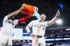 Blue Jays outfielder Alan Roden (right) gets doused with Gatorade by first baseman Vladimir Guerrero Jr. following a win over the Atlanta Braves in Toronto on Tuesday, April 15, 2025. THE CANADIAN PRESS/Thomas Skrlj