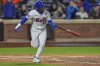 New York Mets' Francisco Lindor (12) reacts as he runs the bases after hitting a three-run home run during the seventh inning of a baseball game against the Philadelphia Phillies Monday, April 21, 2025, in New York. (AP Photo/Frank Franklin II)