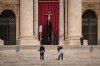 Men wash the steps St. Peter's Basilica before the arrival of the body of Pope Francis, who will lie in state at for three days, at the Vatican, Wednesday, April 23, 2025. (AP Photo/Andreea Alexandru)