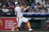Houston Astros' Jose Altuve hits an RBI sacrifice fly during the seventh inning of a baseball game against the Los Angeles Angels, Sunday, April 13, 2025, in Houston. (AP Photo/Kevin M. Cox)