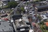 Rescue workers search for survivors at the Jet Set nightclub after its roof collapsed during a merengue concert in Santo Domingo, Dominican Republic, Tuesday, April 8, 2025. (AP Photo/Eddy Vittini)