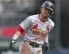 St. Louis Cardinals' Masyn Winn reacts as he rounds the bases after hitting a solo home run during the ninth inning of the first baseball game of a doubleheader against the Cincinnati Reds, Wednesday, April 30, 2025, in Cincinnati. (AP Photo/Jeff Dean)