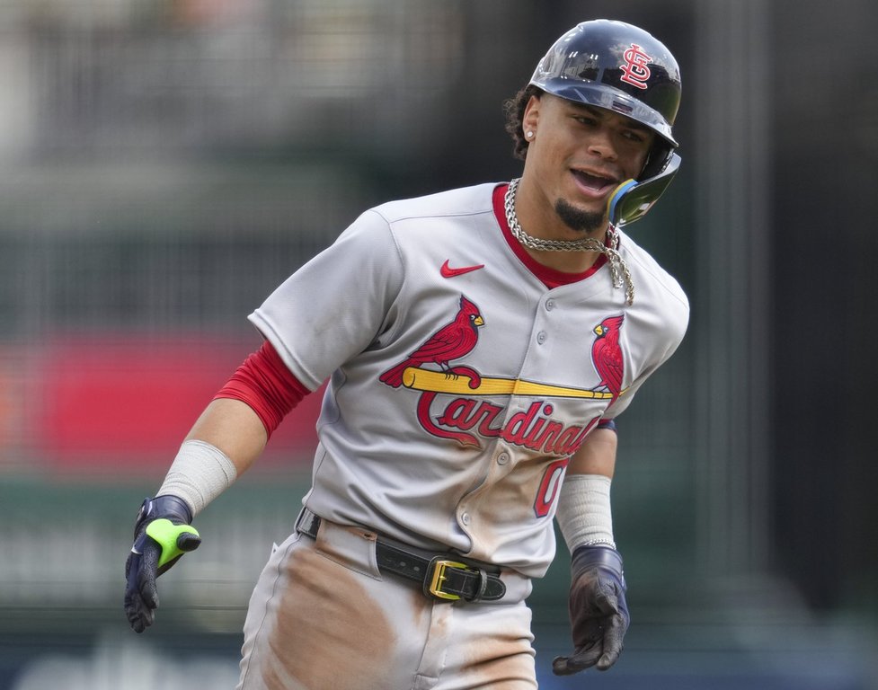 St. Louis Cardinals' Masyn Winn reacts as he rounds the bases after hitting a solo home run during the ninth inning of the first baseball game of a doubleheader against the Cincinnati Reds, Wednesday, April 30, 2025, in Cincinnati. (AP Photo/Jeff Dean)
