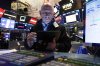 Trader Michael Urkonis works on the floor of the New York Stock Exchange, Thursday, April 17, 2025. (AP Photo/Richard Drew)