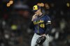 Milwaukee Brewers' Craig Yoho stands on the mound before pitching in the eighth inning of a baseball game against the San Francisco Giants, Monday, April 21, 2025, in San Francisco. (AP Photo/Godofredo A. Vásquez)