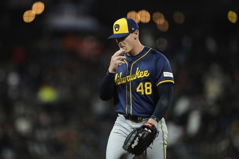 Milwaukee Brewers' Craig Yoho stands on the mound before pitching in the eighth inning of a baseball game against the San Francisco Giants, Monday, April 21, 2025, in San Francisco. (AP Photo/Godofredo A. Vásquez)