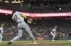Milwaukee Brewers' Christian Yelich hits a grand slam against the San Francisco Giants during the sixth inning of a baseball game in San Francisco, Tuesday, April 22, 2025. (AP Photo/Jeff Chiu)