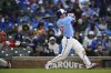 Chicago Cubs' Seiya Suzuki watches his double during the sixth inning of a baseball game against the Philadelphia Phillies, Friday, April 25, 2025, in Chicago. (AP Photo/Paul Beaty)