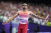 Andre de Grasse, of Canada, celebrates after winning the men's 4 x 100-meter relay final at the 2024 Summer Olympics, Friday, Aug. 9, 2024, in Saint-Denis, France. The 29-year-old from Markham, Ont., capped off an adversity-filled Olympics in August by anchoring Canada's men's 4x100-metre relay team to gold, a first for Canada since 1996. (AP Photo/Petr David Josek)