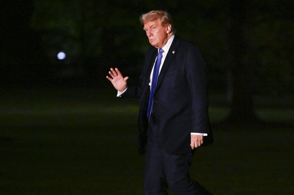President Donald Trump waves as he arrives on the South Lawn of the White House, Thursday, April. 24, 2025, in Washington. (AP Photo/John McDonnell)